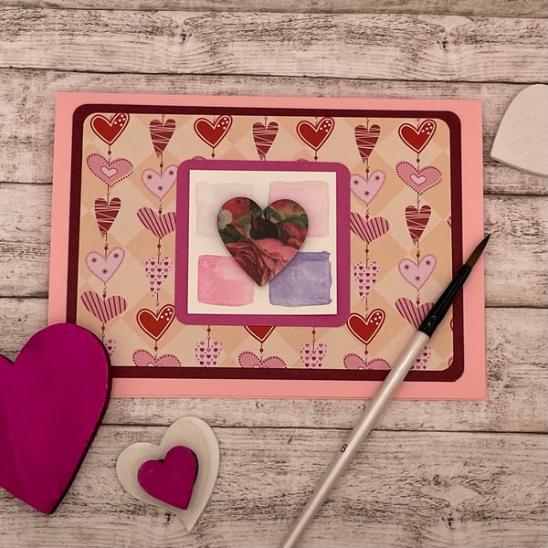 cute engagement card with bright hearts