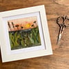 Embroidered sunset hedgerow landscape wet felting.