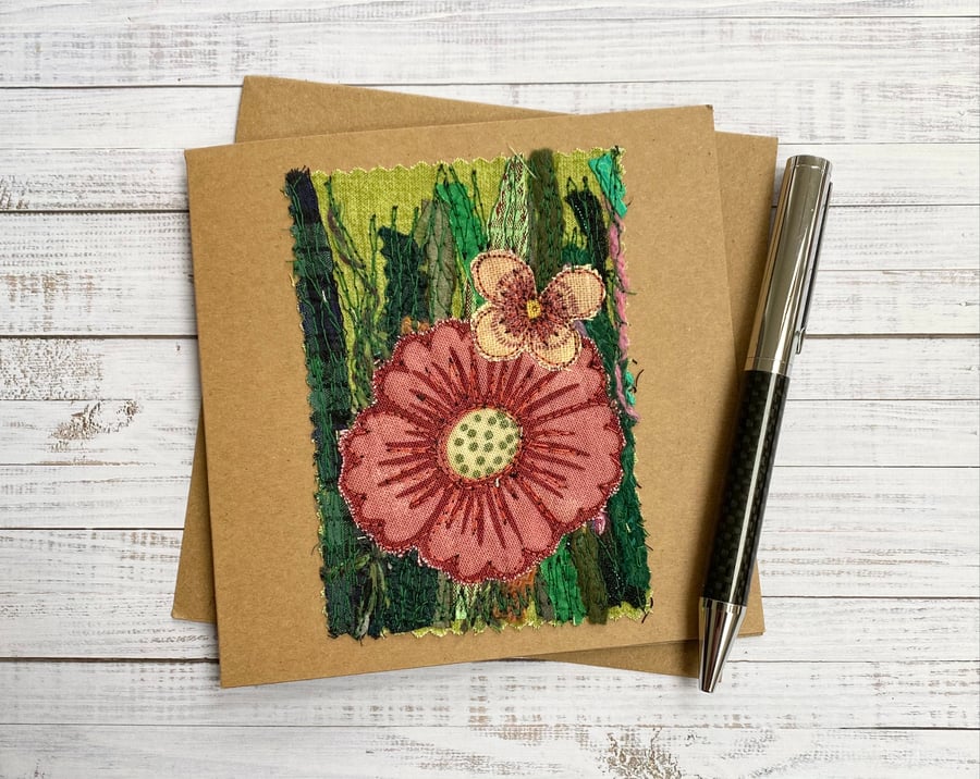 Embroidered flower garden card. 