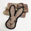 Upcycled embroidered hare brooch pin or badge. 