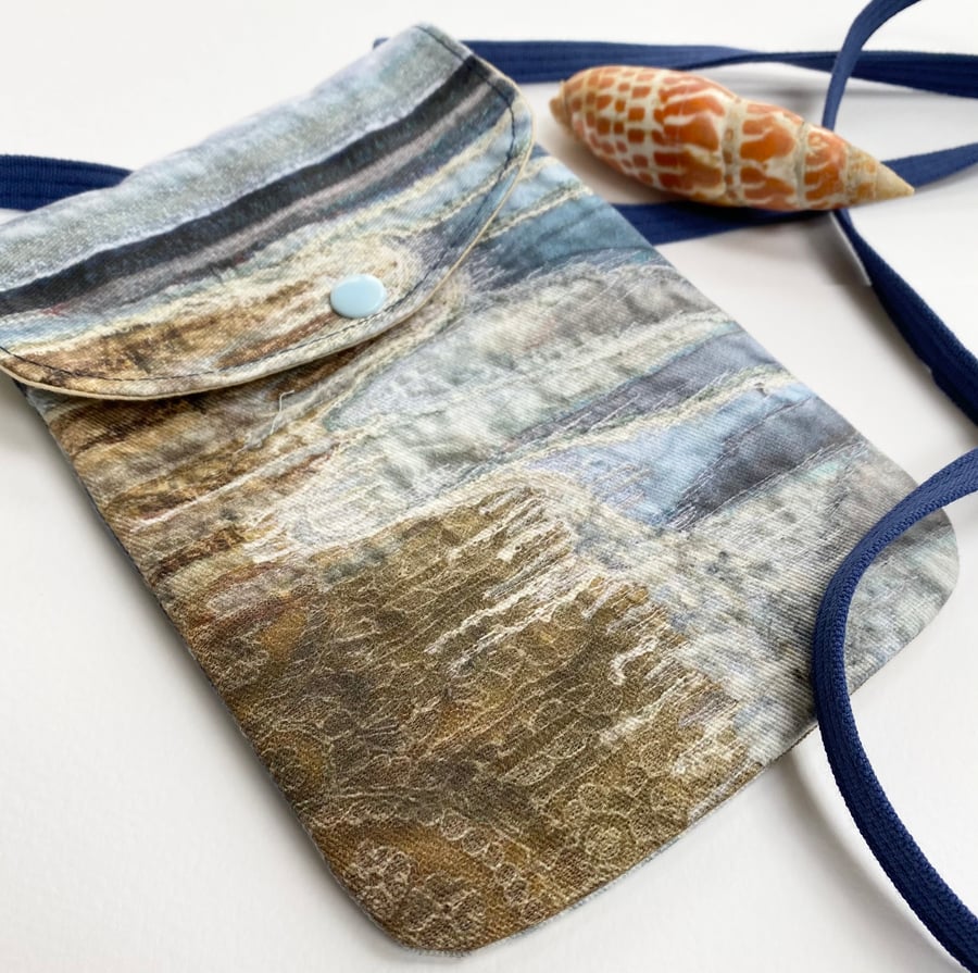 Seascape cross body mobile phone bag with shoulder strap. 