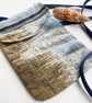 Seascape cross body mobile phone bag with shoulder strap. 