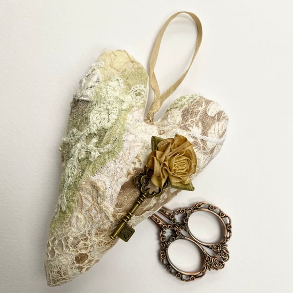 Embroidered up-cycled lace, key and rose love heart decoration.