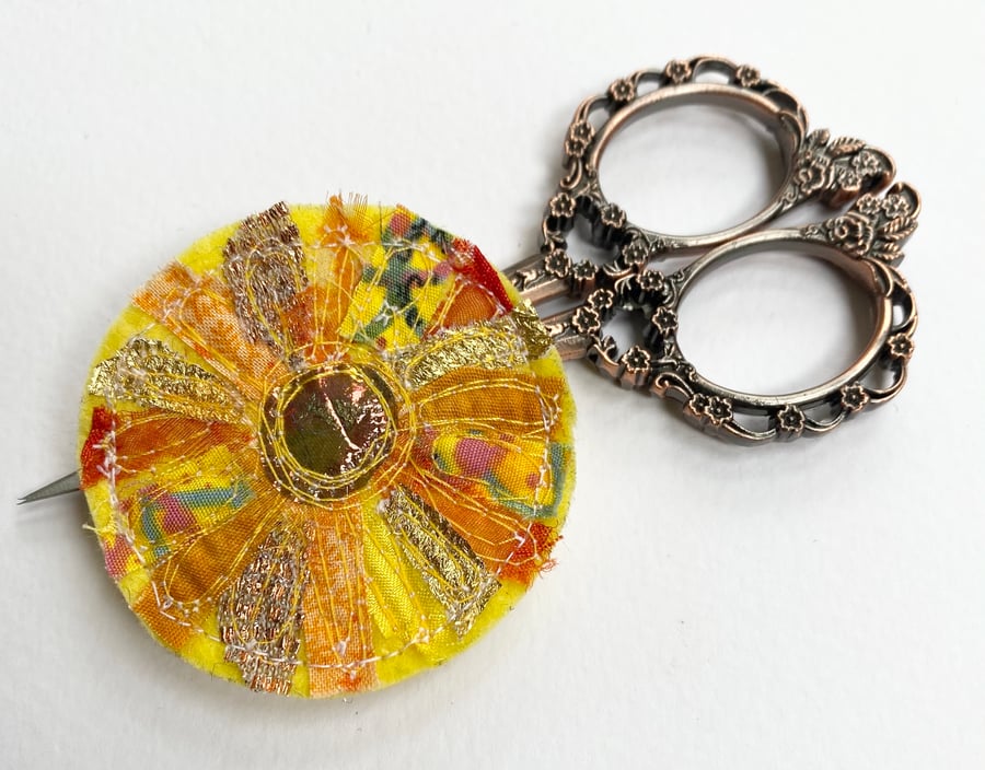 Up-cycled embroidered sun brooch pin or badge.  