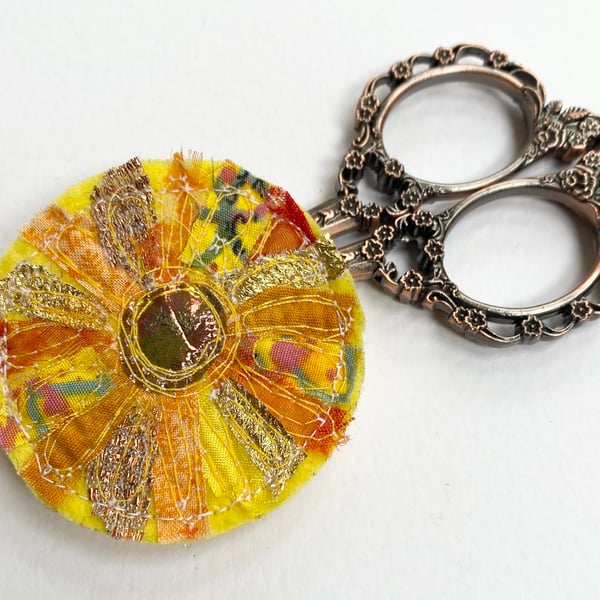 Up-cycled embroidered sun brooch pin or badge.  