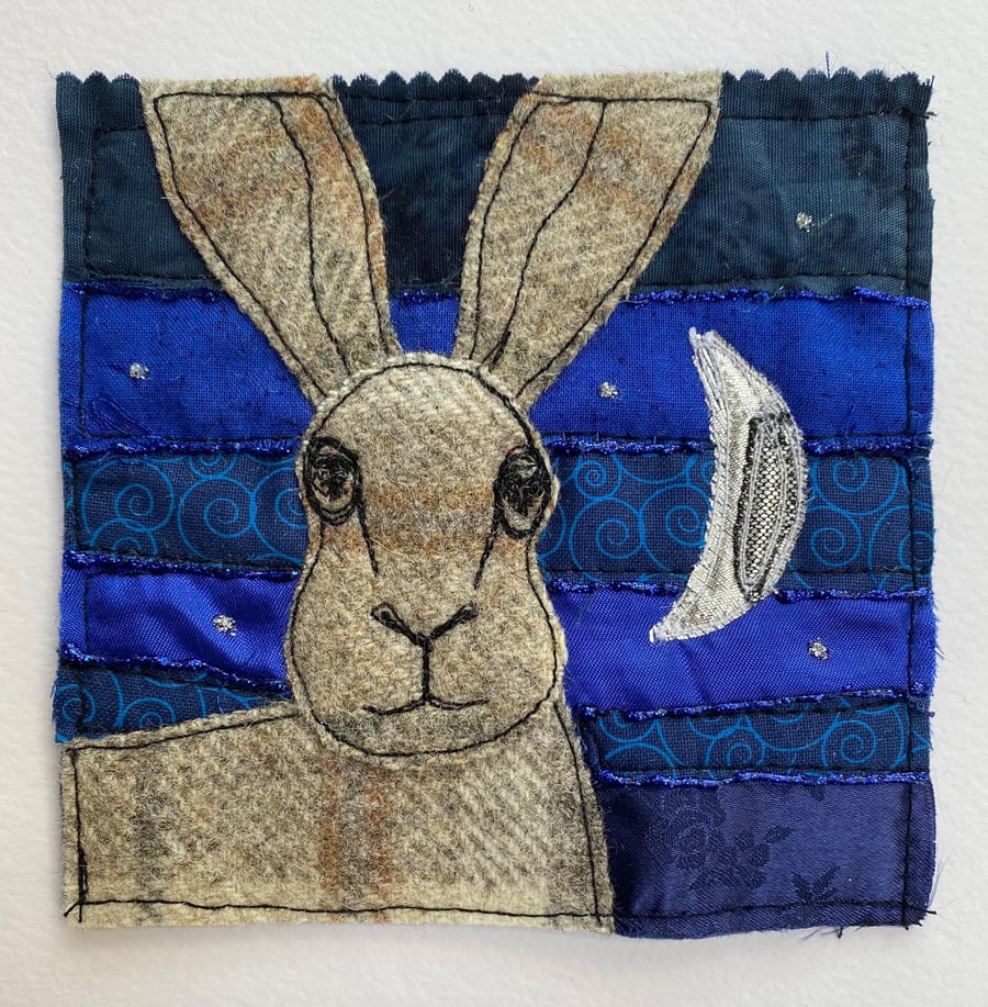 Upcycled hare and moon embroidery. 