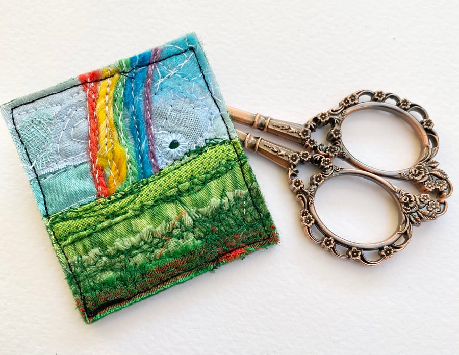 Up-cycled embroidered rainbow brooch pin or badge.  