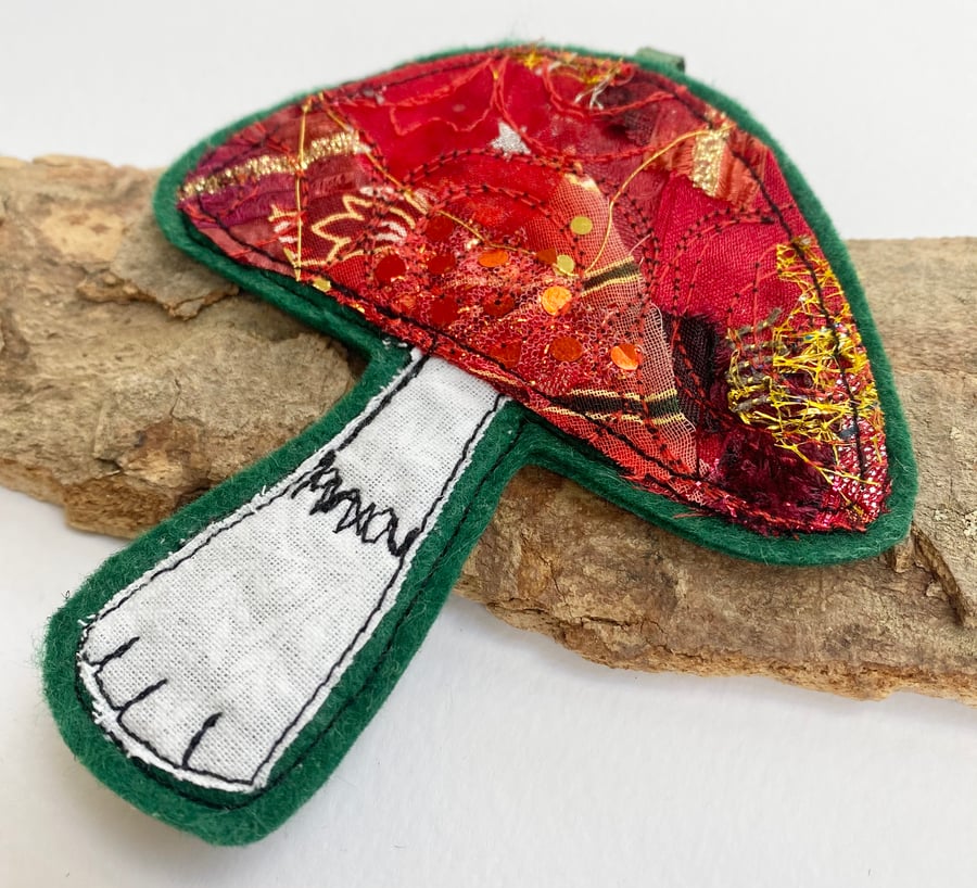 Embroidered up-cycled mushroom garden home decoration.