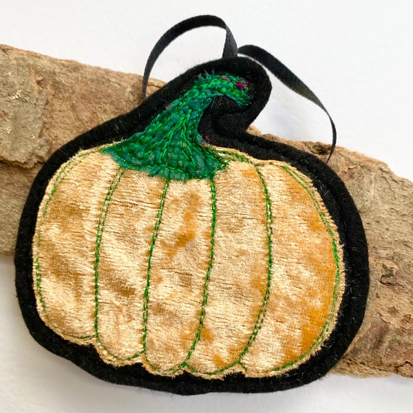 Embroidered up-cycled pumpkin home decoration.