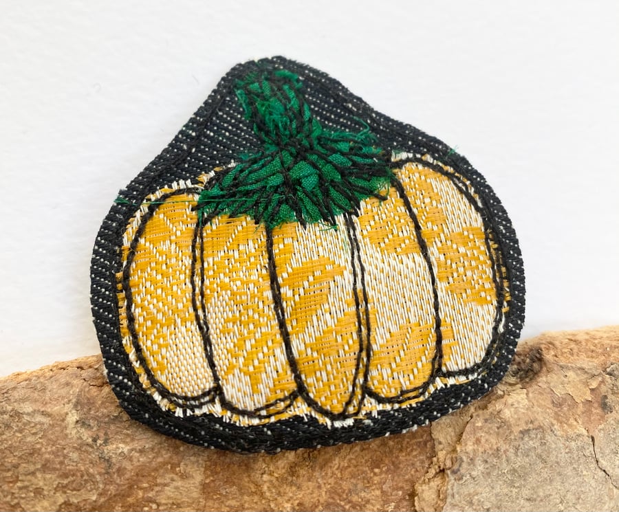 Upcycled Halloween pumpkin brooch pin or badge. 