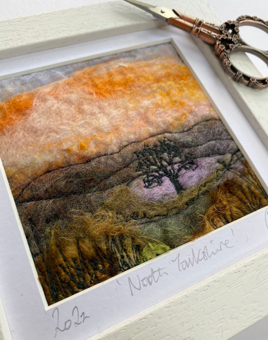 Embroidered moorland landscape wet felting.