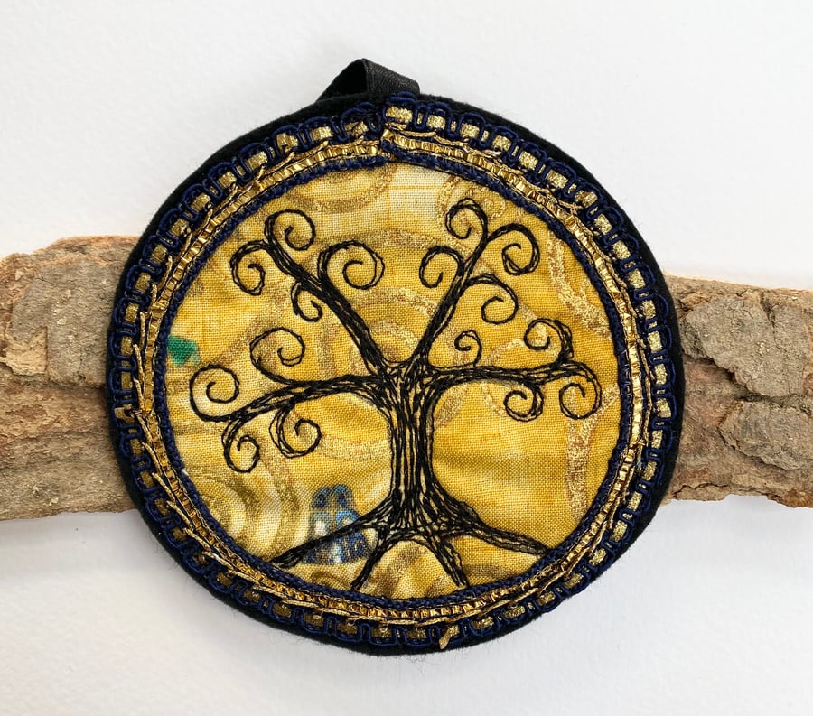 Embroidered up-cycled Tree of Life home decoration. 