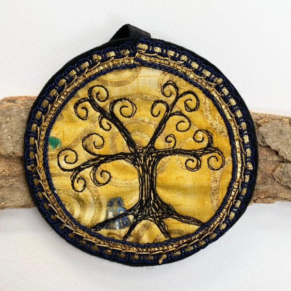 Embroidered up-cycled Tree of Life home decoration. 