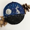Embroidered up-cycled Hare gazing at the moon tree home decoration.