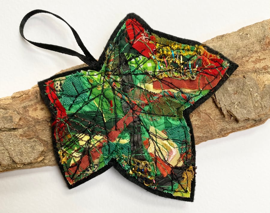 Embroidered up-cycled leaf home decoration.