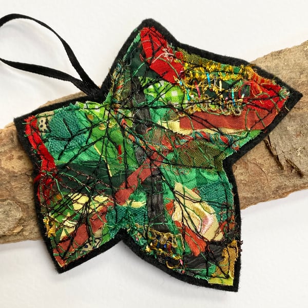 Embroidered up-cycled leaf home decoration.