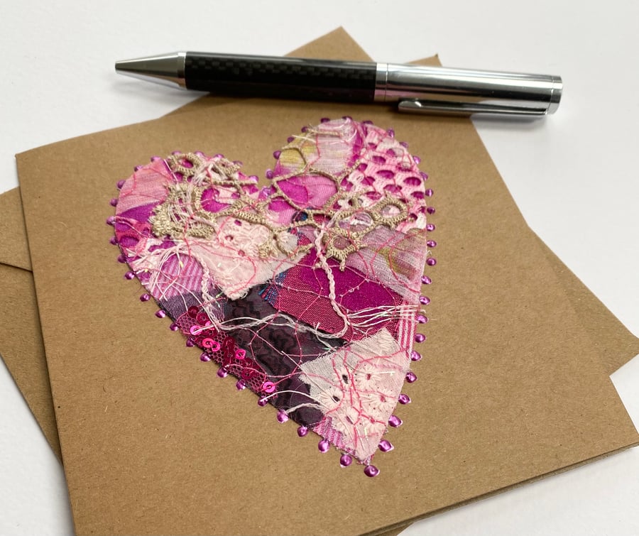 Up-cycled embroidered pink heart card. 