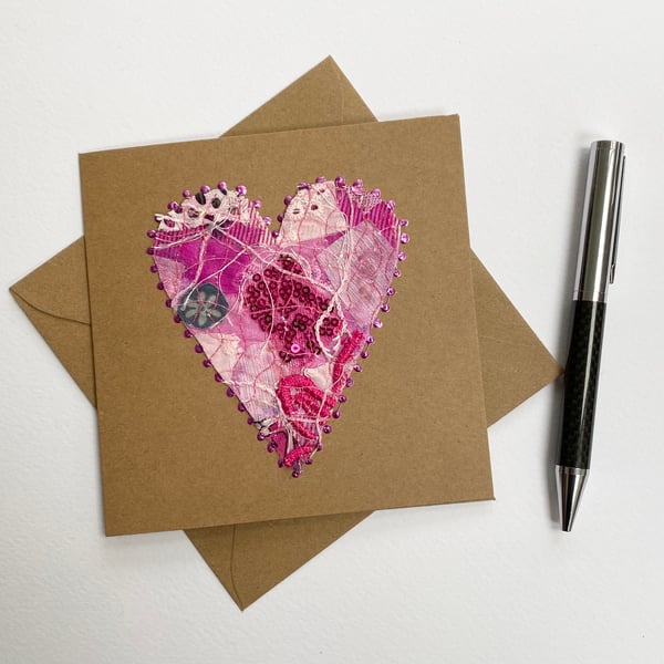 Up-cycled embroidered pink heart card. 