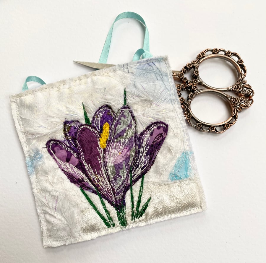 Embroidered up-cycled crocus home decoration.