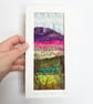 Upcycled and embroidered landscape wall art.