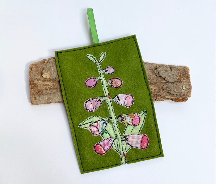 Embroidered up-cycled foxglove home decoration.