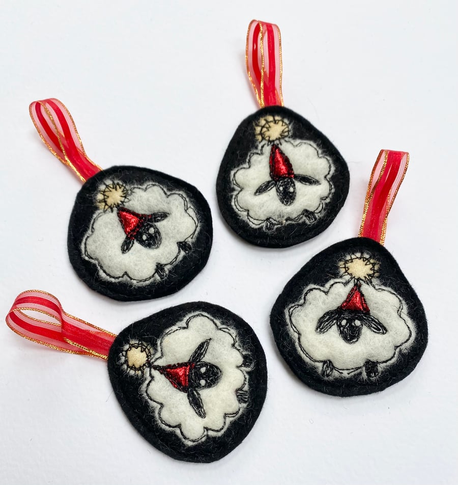 Embroidered Wendsley the sheep tree or home decoration with Christmas hat. 