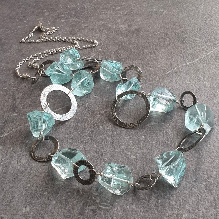Long silver necklace with aqua glass, Statement jewellery, Circle necklace