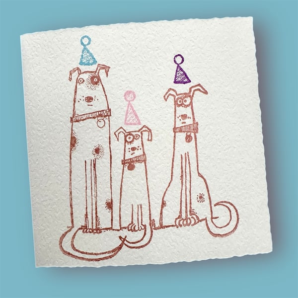 Birthday card with cute dogs in party hats, textured card. 