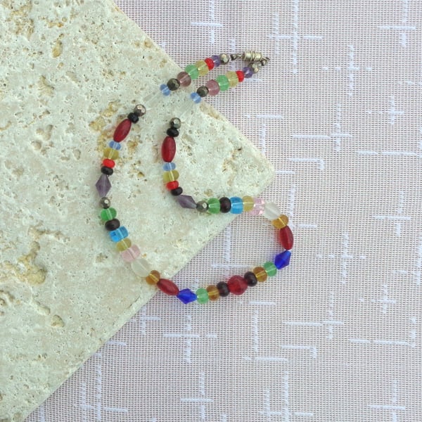 Necklace of bright, fruit drop, multicoloured glass beads 
