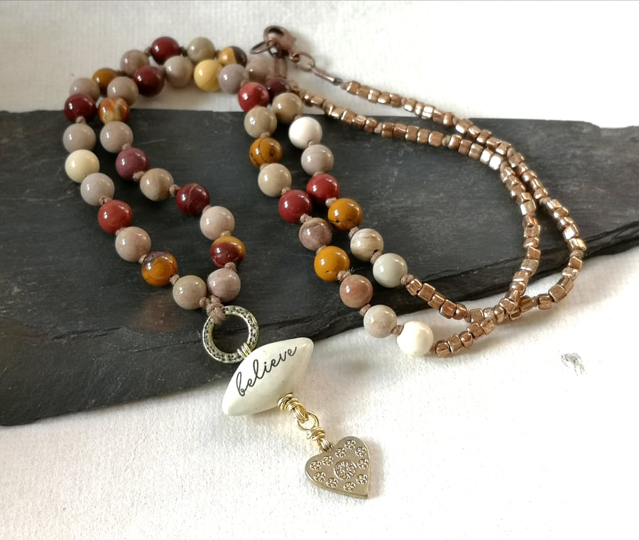 Jasper and mookite knotted necklace with believe pendant