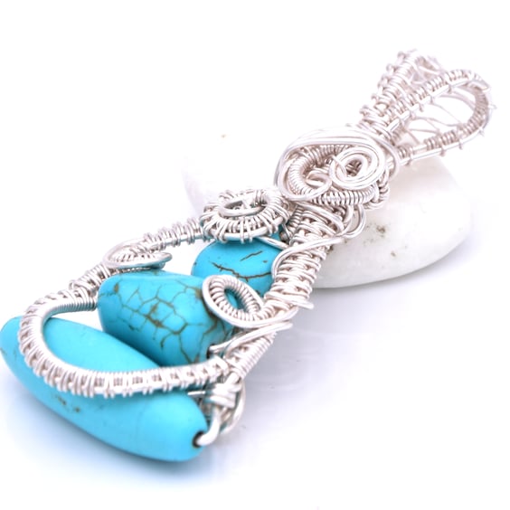 Three beaded turquoise pendant; wire weaved pendant