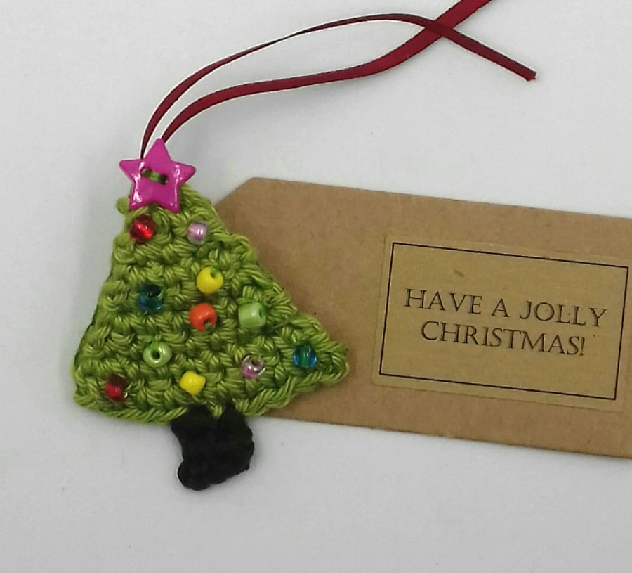 Crochet Christmas Tree Brooch on a Tag