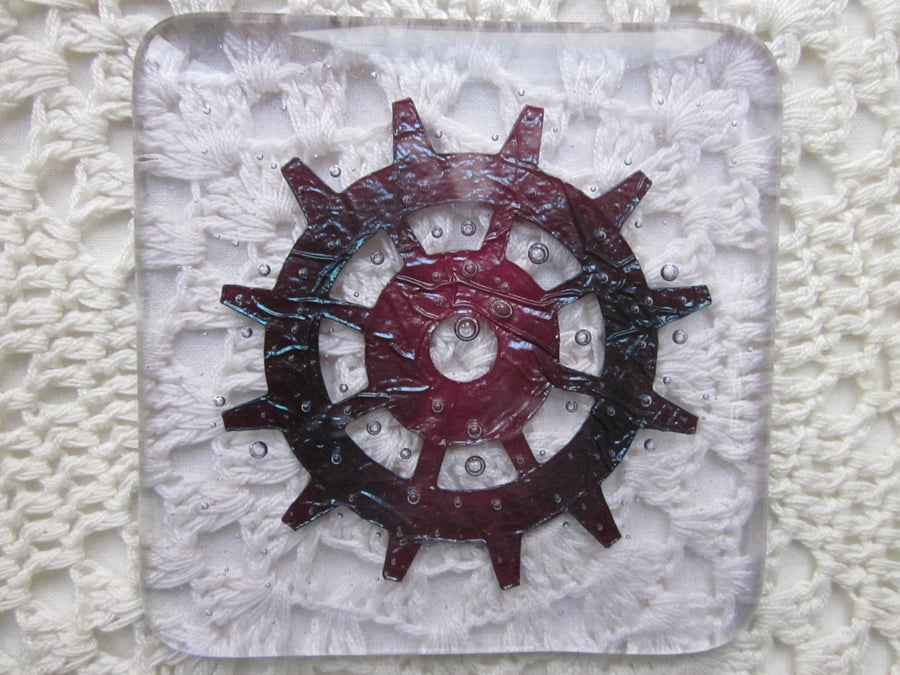 Handmade fused glass coaster - copper cog or ship's wheel on hint of purple tint