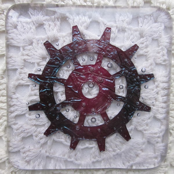 Handmade fused glass coaster - copper cog or ship's wheel on hint of purple tint