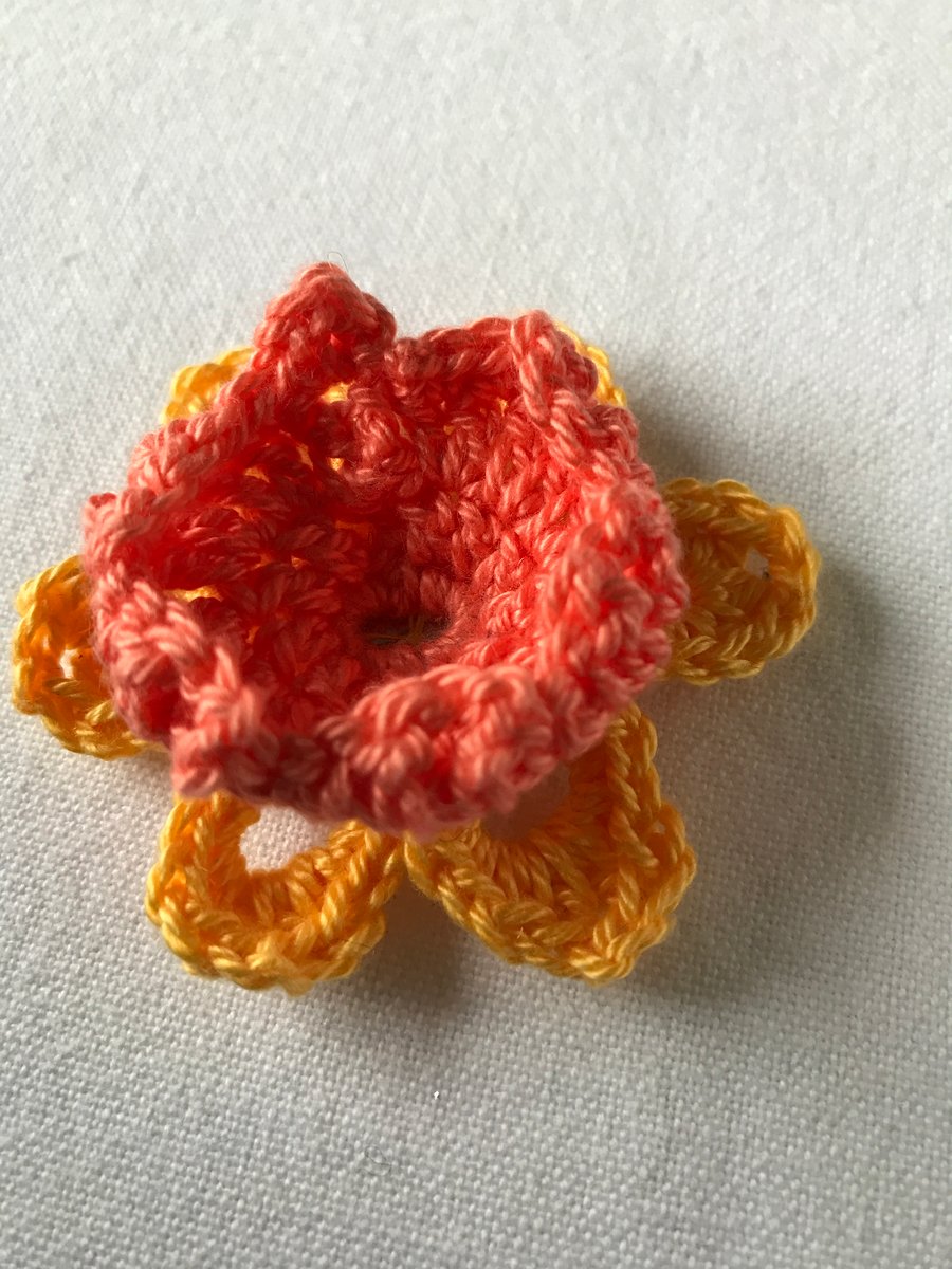 Crocheted daffodil brooch