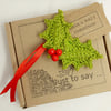 . Crochet Holly Brooch on a Gift Tag