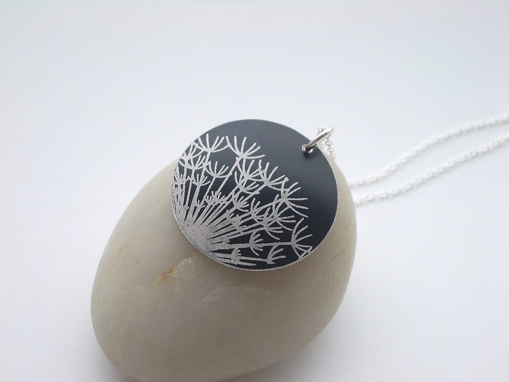 Black dandelion seed disc pendant necklace 