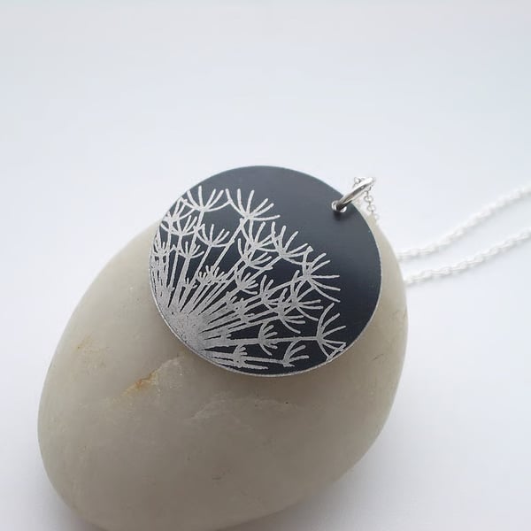 Black dandelion seed disc pendant necklace 