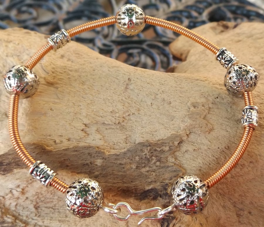 7.5" silver plated bracelet with copper gizmo wire cover