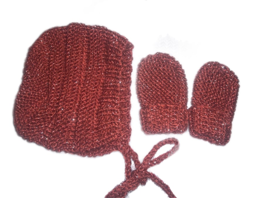 Knitted gift set for babies including mittens, headband and bonnet