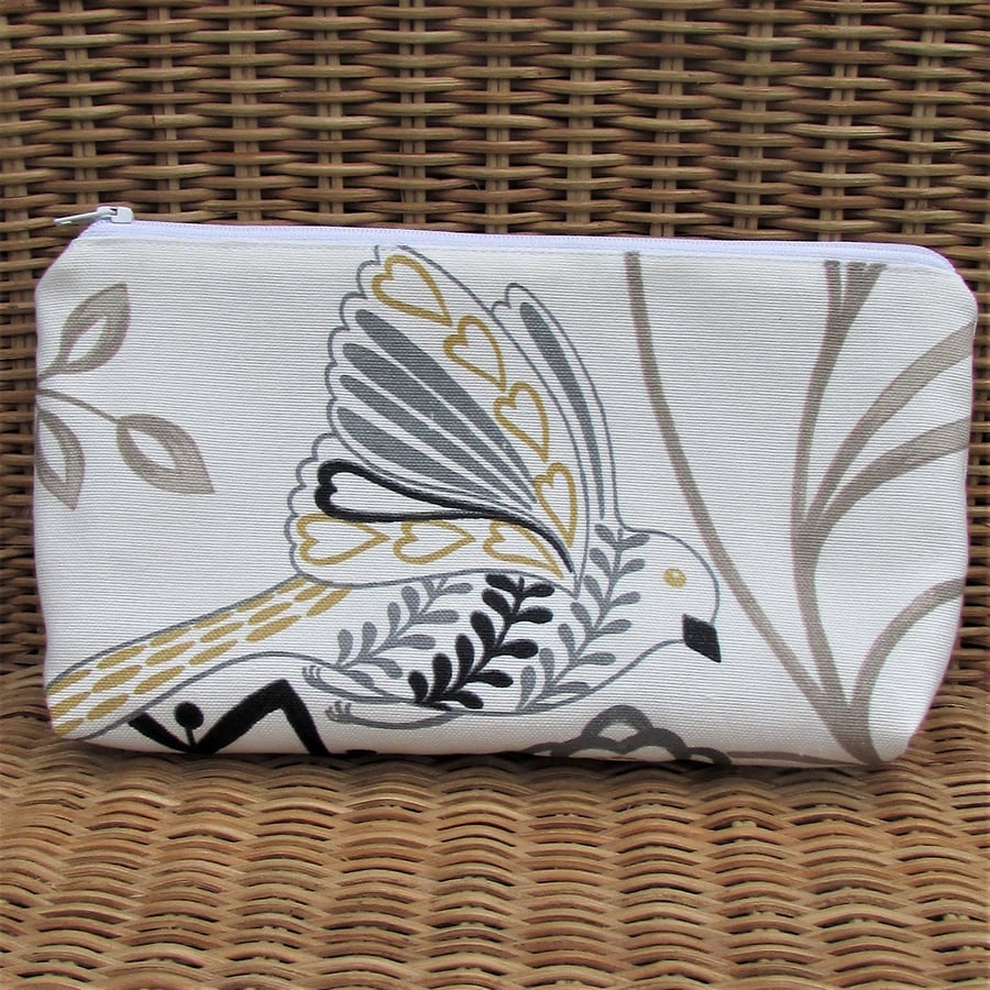 White, black, gold and grey floral and bird cosmetic bag