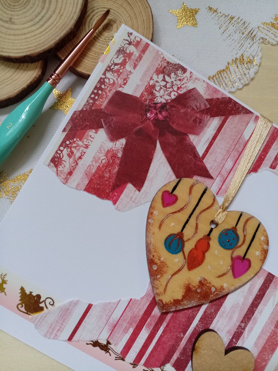 Christmas card with a wooden hanging baubles decoration