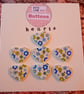 Set of Seven Heart Buttons – Blue and Green Floral Design - Image 1