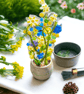 Glass Bouquet Plant. Yellow and Blue Flowers and a Butterfly. Gift Idea. 