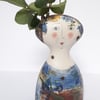 Figurative ceramic vase 