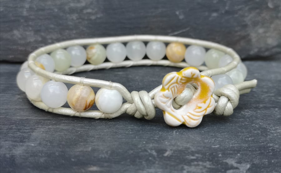 Botswana jade and leather bracelet with yellow ceramic flower button