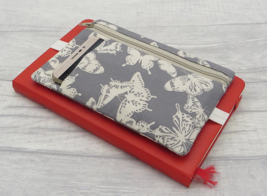 Zipped pouch for journals, planners, diary with elastic band.