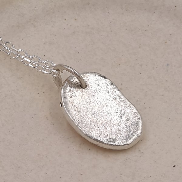 Molten Silver Oval Droplet Pendant