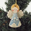 Teeny little ceramic angel Christmas decoration