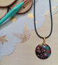 Quirky circular patterned hand painted wooden necklace 